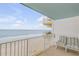 Balcony overlooking the ocean and sandy beach at 5203 S Atlantic Ave # 412B, New Smyrna Beach, FL 32169