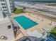 Oceanfront pool and deck area with ample seating and umbrellas at 5203 S Atlantic Ave # 412B, New Smyrna Beach, FL 32169