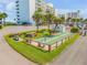 Outdoor shuffleboard court and picnic tables at 5203 S Atlantic Ave # 412B, New Smyrna Beach, FL 32169