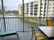 Relaxing lanai with lake view and seating at 5300 S Atlantic Ave # 8-302, New Smyrna Beach, FL 32169