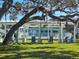 Relaxing courtyard with shaded seating areas at 541 S Peninsula Ave # A03, New Smyrna Beach, FL 32169