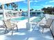 Refreshing pool area with ample seating and shade at 541 S Peninsula Ave # A03, New Smyrna Beach, FL 32169