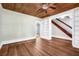 Living room with hardwood floors, built-in shelving, and wood ceiling at 608 Magnolia St, New Smyrna Beach, FL 32168