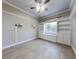 Spacious bedroom with built-in shelving and hardwood floors at 720 Stonewood Ct, New Smyrna Beach, FL 32168