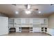 Bonus room with extensive built-in shelving and hardwood floors at 720 Stonewood Ct, New Smyrna Beach, FL 32168