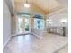 Spacious dining room with tile floors and large windows at 720 Stonewood Ct, New Smyrna Beach, FL 32168