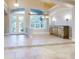 Spacious dining room with tile floors and large windows at 720 Stonewood Ct, New Smyrna Beach, FL 32168