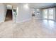 Light-filled entryway with tile floors and staircase at 720 Stonewood Ct, New Smyrna Beach, FL 32168