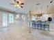 Bright Gathering room with tile floors and built-in shelving at 720 Stonewood Ct, New Smyrna Beach, FL 32168