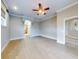 Spacious living room featuring hardwood floors and an arched entryway at 720 Stonewood Ct, New Smyrna Beach, FL 32168