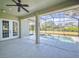 Screened patio with pool and lush backyard view at 720 Stonewood Ct, New Smyrna Beach, FL 32168