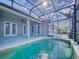 Enjoy this relaxing screened pool and patio, ideal for outdoor fun at 720 Stonewood Ct, New Smyrna Beach, FL 32168