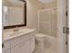 Clean bathroom with a shower/tub combo and white vanity at 809 E 7Th Ave, New Smyrna Beach, FL 32169