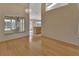 Bright dining room with hardwood floors and kitchen view at 809 E 7Th Ave, New Smyrna Beach, FL 32169