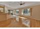 Hardwood floor living room with pool view at 809 E 7Th Ave, New Smyrna Beach, FL 32169