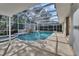 Inviting screened pool and spa at 809 E 7Th Ave, New Smyrna Beach, FL 32169