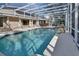 Large screened pool and spa, perfect for relaxation at 809 E 7Th Ave, New Smyrna Beach, FL 32169