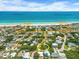 Aerial view showing home's location near the beach, highlighting its proximity to the ocean at 81 Alberta Ave, Ponce Inlet, FL 32127