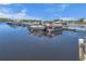 Calm water marina with multiple boat slips and docks at 81 Alberta Ave, Ponce Inlet, FL 32127