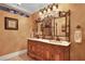 Elegant double vanity with ornate mirror and ample counter space at 817 Hail Ct, Port Orange, FL 32127