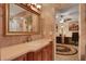 Elegant bathroom with a large vanity and walk-in shower at 817 Hail Ct, Port Orange, FL 32127