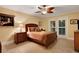 Serene bedroom with a king-size bed and private access at 817 Hail Ct, Port Orange, FL 32127