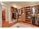 Spacious walk-in closet with custom shelving and drawers at 817 Hail Ct, Port Orange, FL 32127