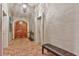 Elegant entryway with arched doorways and terracotta tile floors at 817 Hail Ct, Port Orange, FL 32127