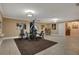 Bright home gym with weight machine and leopard rug at 817 Hail Ct, Port Orange, FL 32127