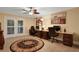 Spacious home office with built-in desks and double doors at 817 Hail Ct, Port Orange, FL 32127