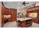 Island kitchen with granite countertops and stainless steel appliances at 817 Hail Ct, Port Orange, FL 32127