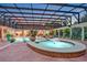 Relaxing pool and spa area with a covered patio and multiple fountains at 817 Hail Ct, Port Orange, FL 32127