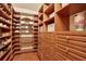 Spacious walk-in closet with ample shelving and drawers for storage at 817 Hail Ct, Port Orange, FL 32127