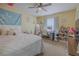 Bedroom with a queen-size bed, vanity, and plenty of storage at 980 Canal View Blvd # C7, Port Orange, FL 32129