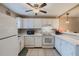 Clean and functional kitchen with white cabinets at 980 Canal View Blvd # C7, Port Orange, FL 32129