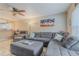 Relaxing living room featuring sectional sofa and ottoman at 980 Canal View Blvd # C7, Port Orange, FL 32129