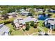 Aerial view of waterfront community with walking paths and nearby parking at 105 Wood Duck Cir # 1C, Daytona Beach, FL 32119