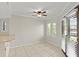 Dining area boasts tile floors and sliding doors to a patio at 105 Wood Duck Cir # 1C, Daytona Beach, FL 32119