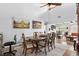 Bright dining room with a large wood table and six chairs at 105 Wood Duck Cir # 1C, Daytona Beach, FL 32119