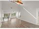 Bright and airy living room boasts vaulted ceilings and views of lush landscape at 105 Wood Duck Cir # 1C, Daytona Beach, FL 32119