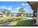 This home overlooks a serene pond from a porch and offers tranquil outdoor living space at 105 Wood Duck Cir # 1C, Daytona Beach, FL 32119