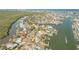 Aerial view of a waterfront community and canal at 107 Via Amalfi, New Smyrna Beach, FL 32169