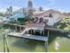 Luxury waterfront home with private dock and boat lift at 107 Via Amalfi, New Smyrna Beach, FL 32169