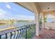 Balcony overlooking a canal with water access and neighborhood views at 107 Via Amalfi, New Smyrna Beach, FL 32169