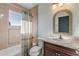 Clean bathroom with a tub, toilet and sink at 107 Via Amalfi, New Smyrna Beach, FL 32169