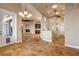 Open dining area with tile flooring and a chandelier at 107 Via Amalfi, New Smyrna Beach, FL 32169