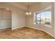 Casual dining area with large window and tile flooring at 107 Via Amalfi, New Smyrna Beach, FL 32169