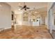 Open living space with tile floors and kitchen access at 107 Via Amalfi, New Smyrna Beach, FL 32169