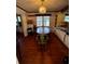 Dining room with hardwood floors and a round table at 1132 Australia Ave, Daytona Beach, FL 32114