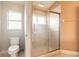 Small bathroom with toilet and shower at 1155 Kilkenny Ln, Ormond Beach, FL 32174